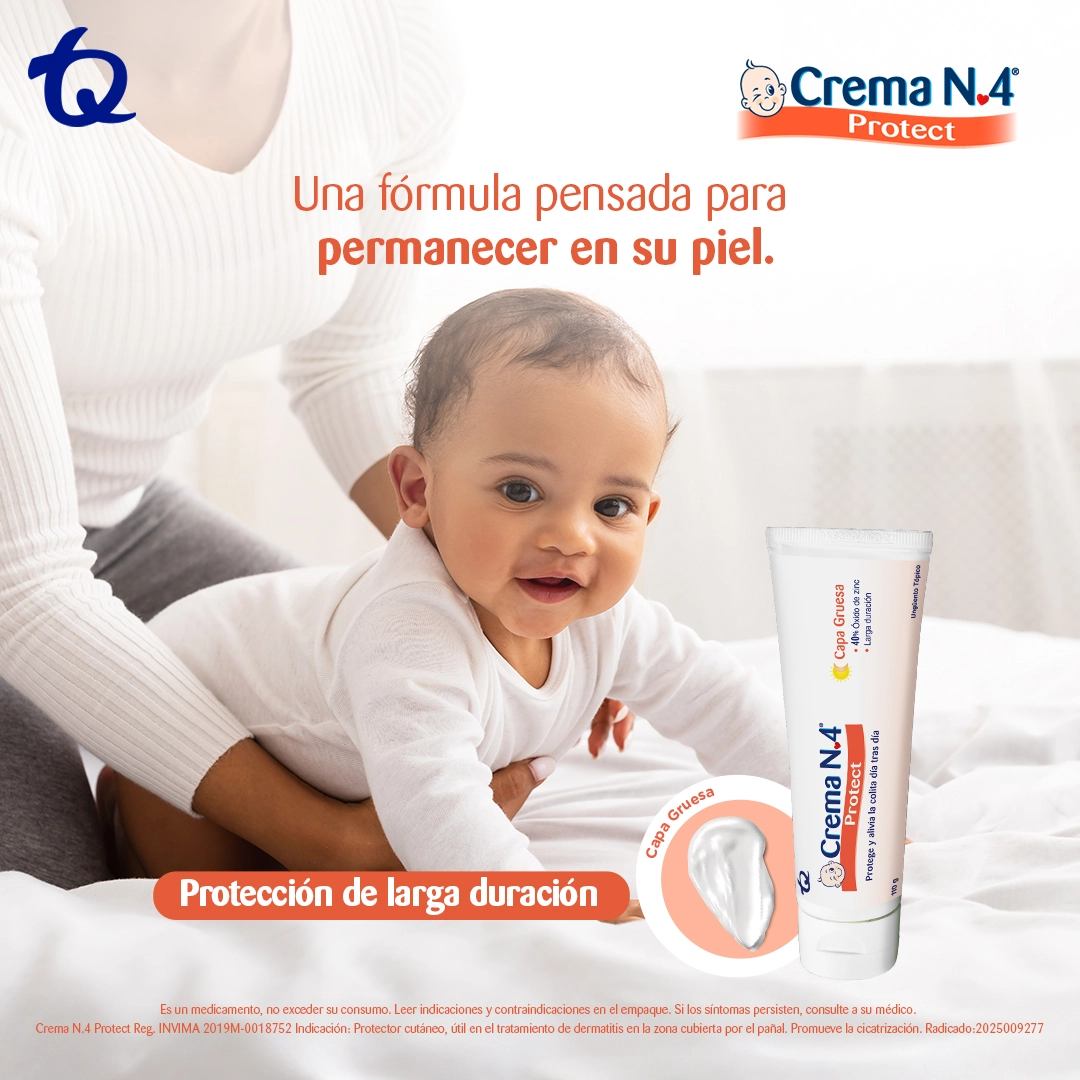 Bebé sonriente junto al tubo de Crema N.4 Protect